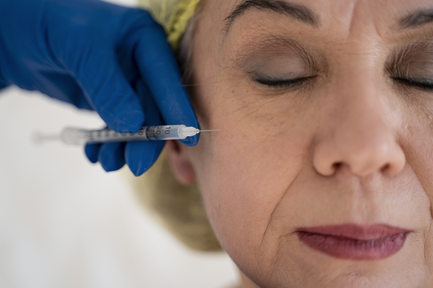 close-up-senior-woman-getting-injection (1)